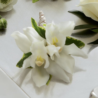 White Mini Cymbidium Boutonniere –  Loop Flower Studio, Chicago IL
